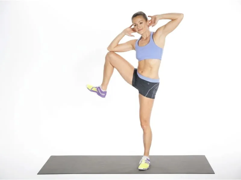 Standing knee-to-elbow – Đưa gối chạm khuỷu tay khi đứng